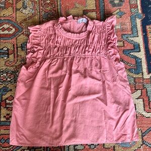 Woman’s pink smocked Greylin blouse